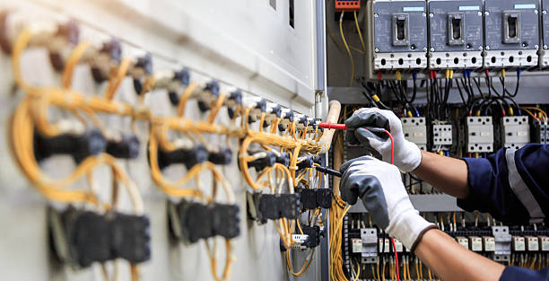 Professional Electrical Panel Upgrade technician working in Fresno County County, CA